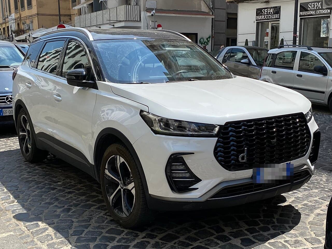 DR 6.0 bianca, vista di tre quarti anteriore